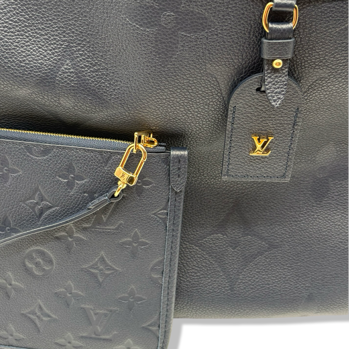 Pre-Owned Louis Vuitton Empreinte Leather CarryAll MM Navy - LV1967
